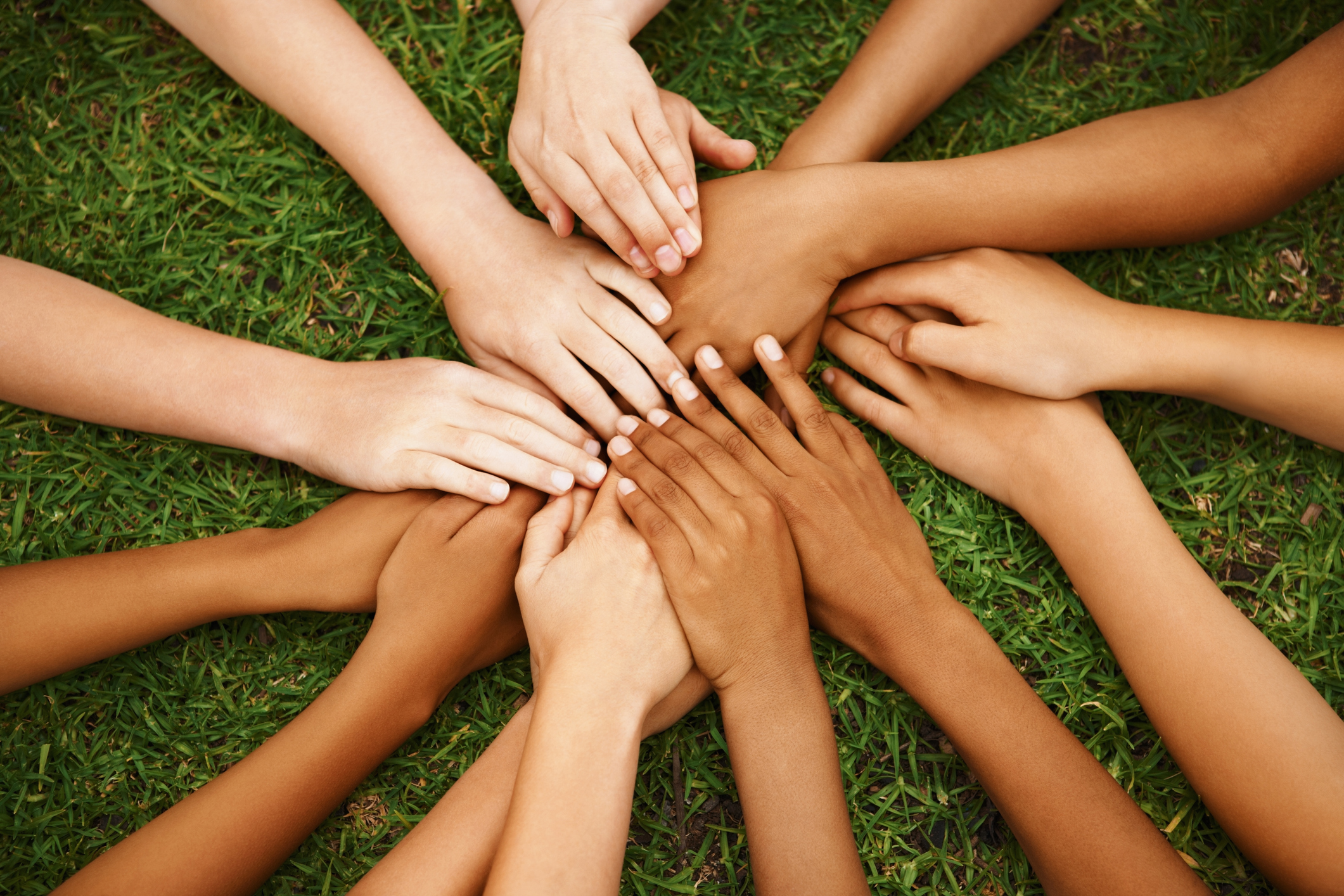 Group of multi-ethnic children with their hands together